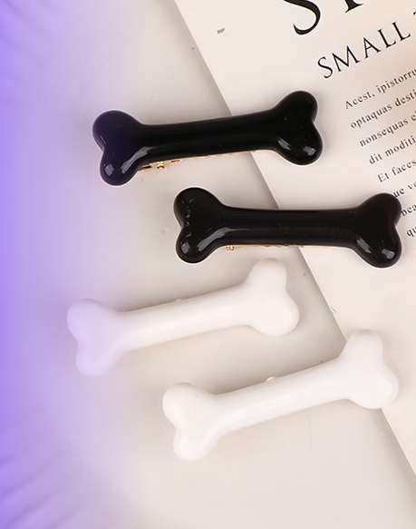 Par de pinzas huesitos